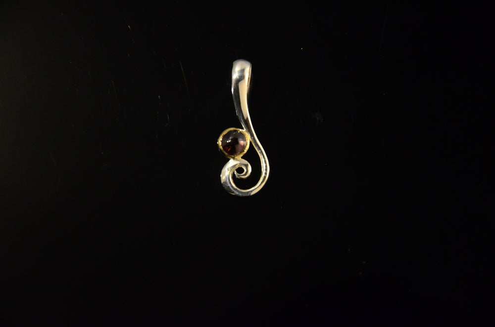 Curl Pendant with Garnet